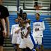 Lincoln High School senior Tyler Hinton celebrates with his team after scoring the game-winning basket during the final seconds against Dexter on Tuesday, Jan. 29. Lincoln won 48-46. Daniel Brenner I AnnArbor.com